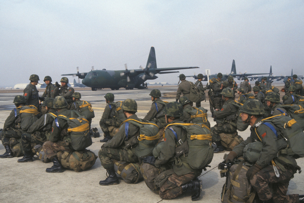 Korean paratroopers stand ready on the flight line before boarding a C-130  Hercules aircraft during Exercise TEAM SPIRIT'86 - PICRYL - Public Domain  Media Search Engine Public Domain Search