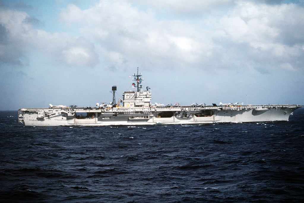 A starboard view of the aircraft carrier USS JOHN F. KENNEDY (CV-67 ...