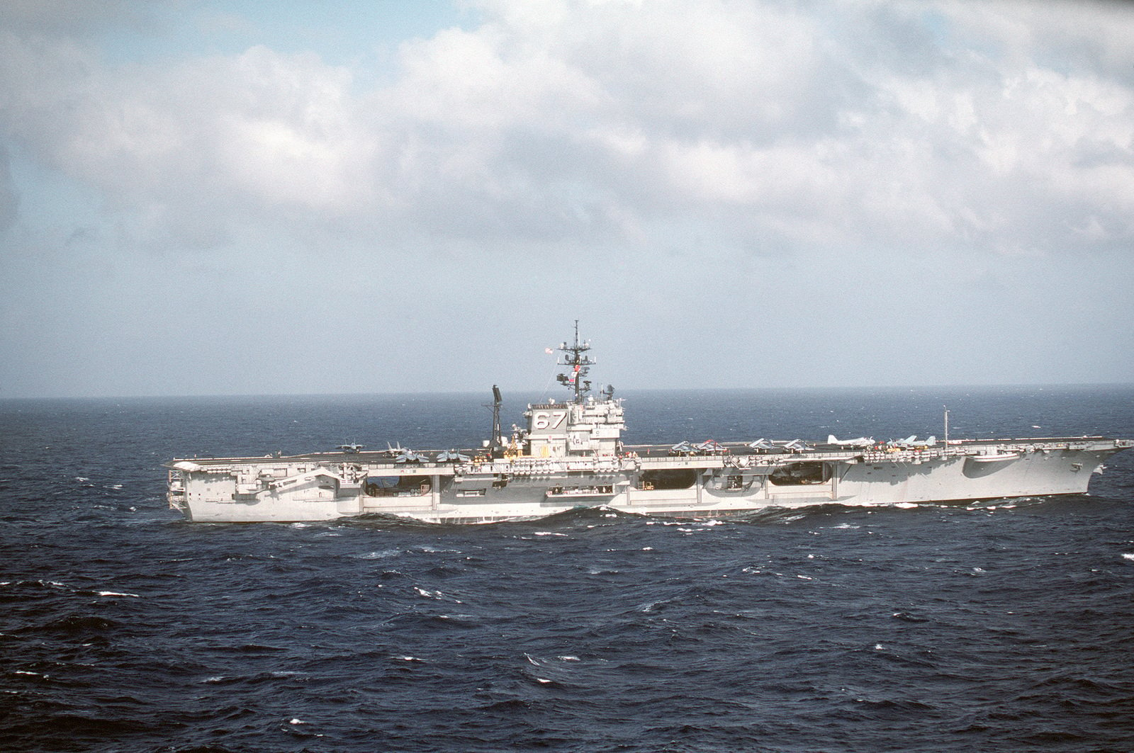 A starboard view of the aircraft carrier USS JOHN F. KENNEDY (CV 67 ...