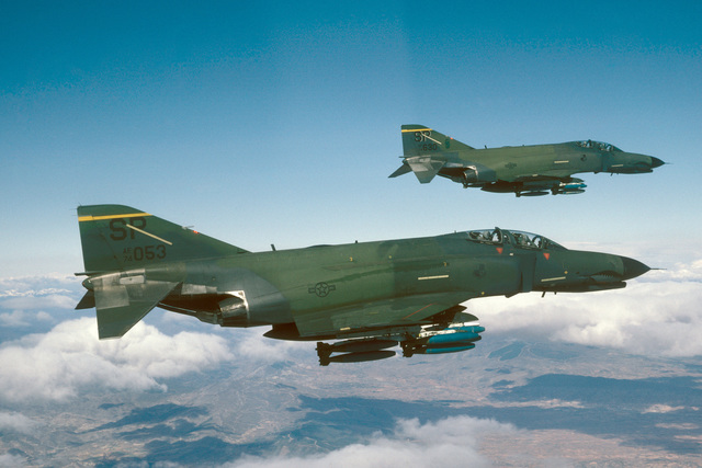 An air to air right side view of two 81st Tactical Fighter Squadron F4 ...