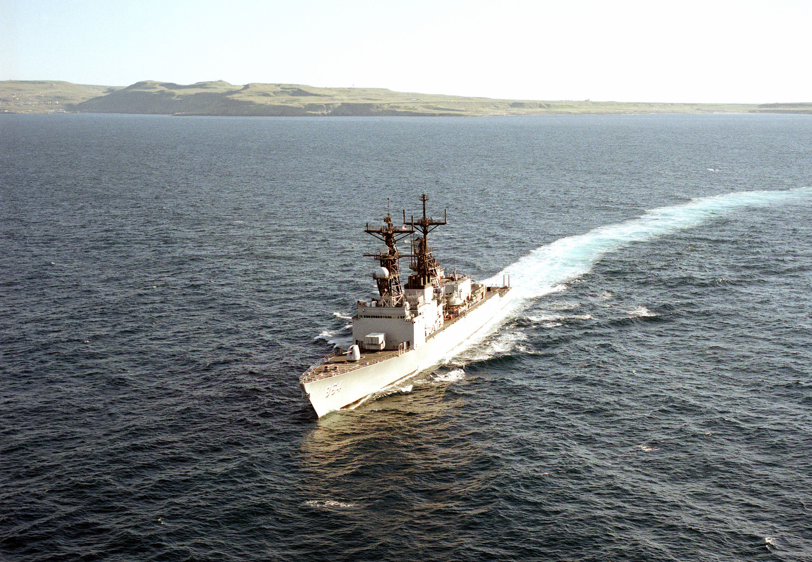 An elevated port bow view of the destroyer USS PAUL FOSTER (DD 964 ...