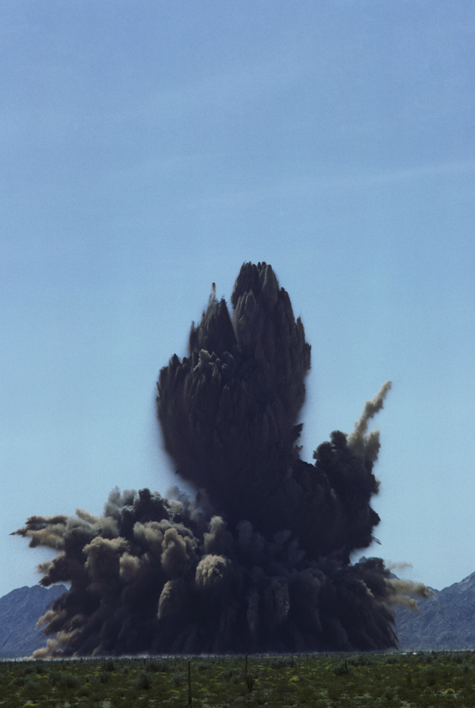 Explosives are detonated during an underground silo survivability test ...