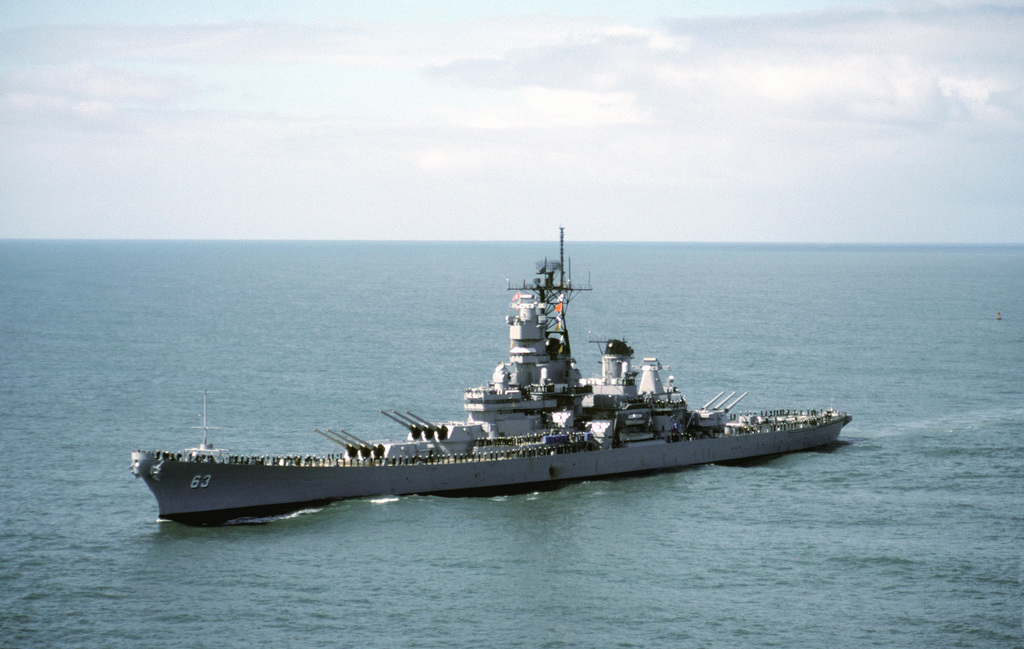 An elevated port bow view of the battleship USS MISSOURI (BB 63) en ...