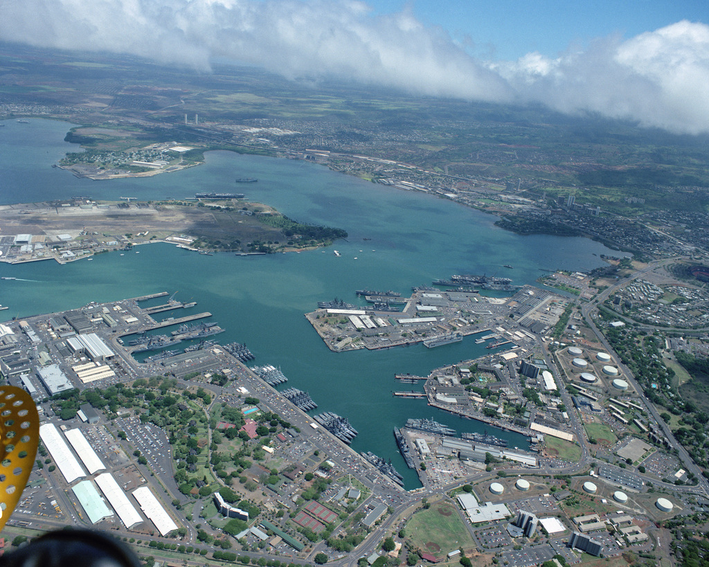 An Aerial View Of Ford Island, The Naval Shipyard And The Naval Supply 