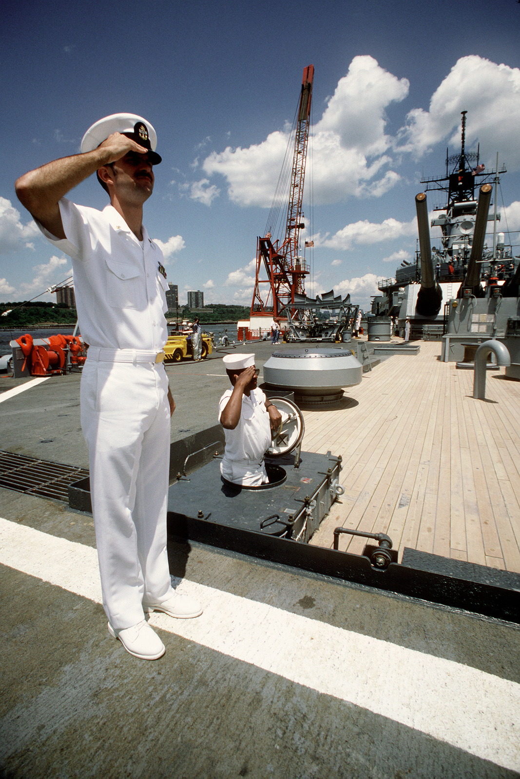 Crew Members Salute Aboard The Battleship Battleship USS IOWA (BB-61 ...