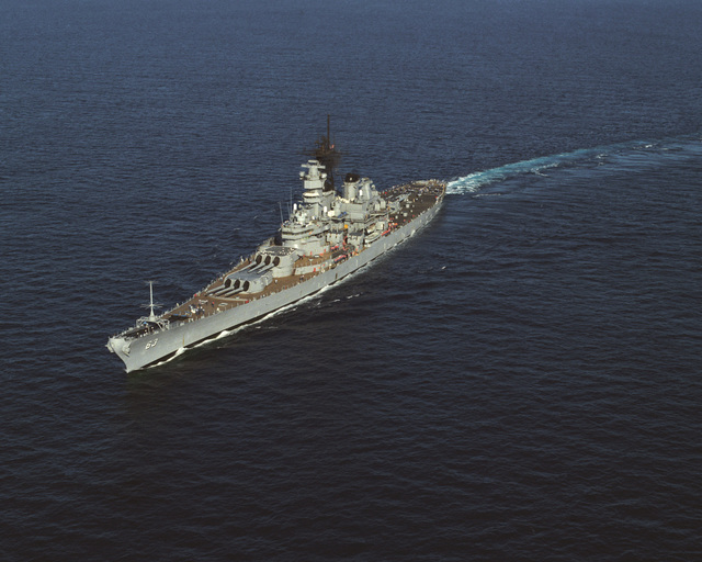 An aerial port bow view of the battleship USS MISSOURI (BB 63) underway ...