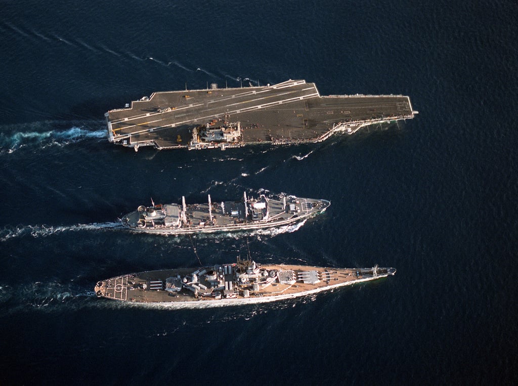 An overhead view of the fleet oiler USNS KAWISHIWI (T-AO-146), center ...