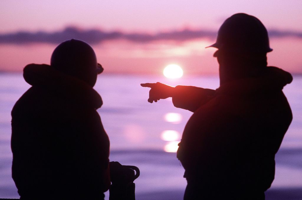 Two Sailors Aboard The Battleship USS IOWA (BB-61) Wait For Early ...