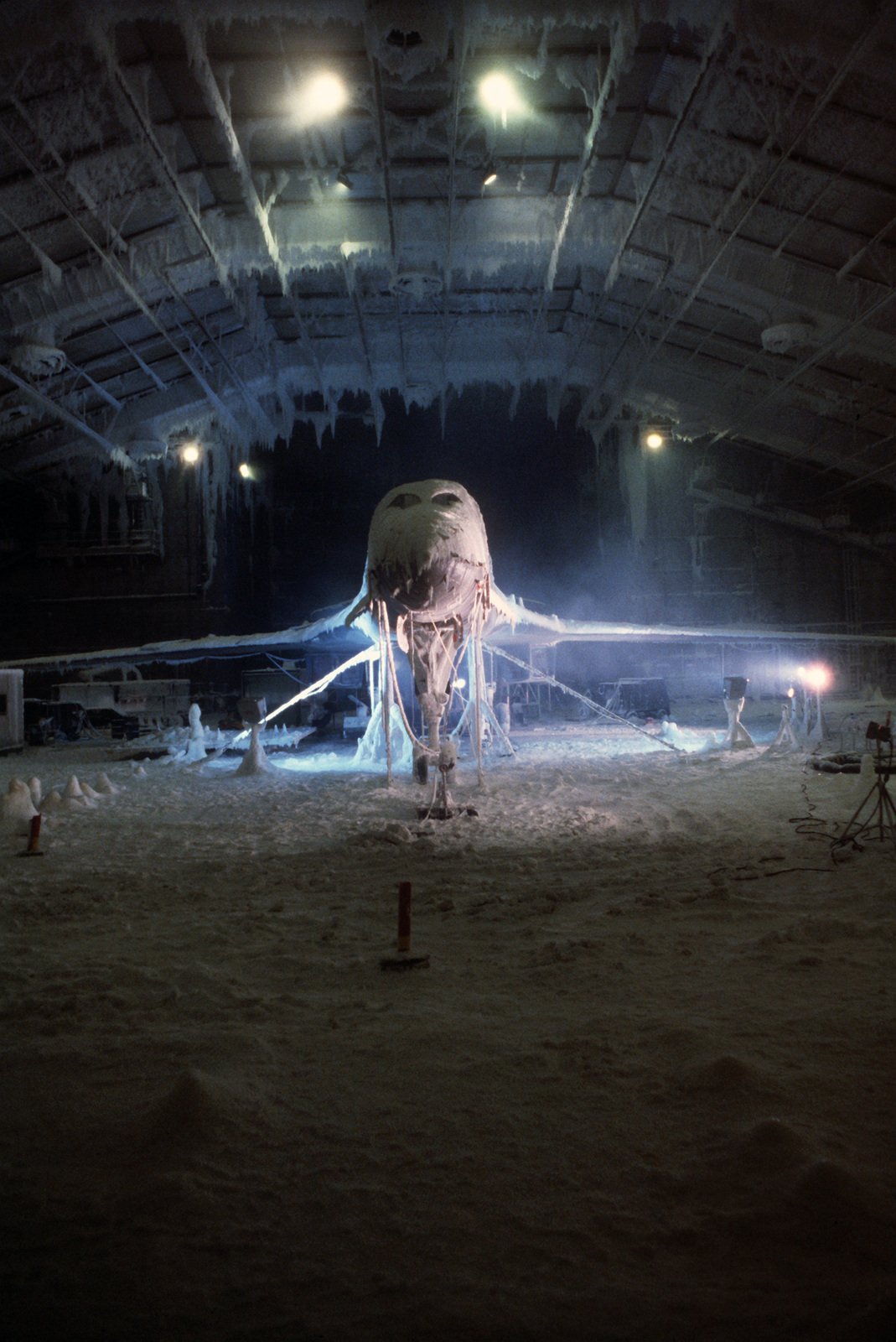 An ice and snow-covered B-1B aircraft undergoes simulated arctic ...