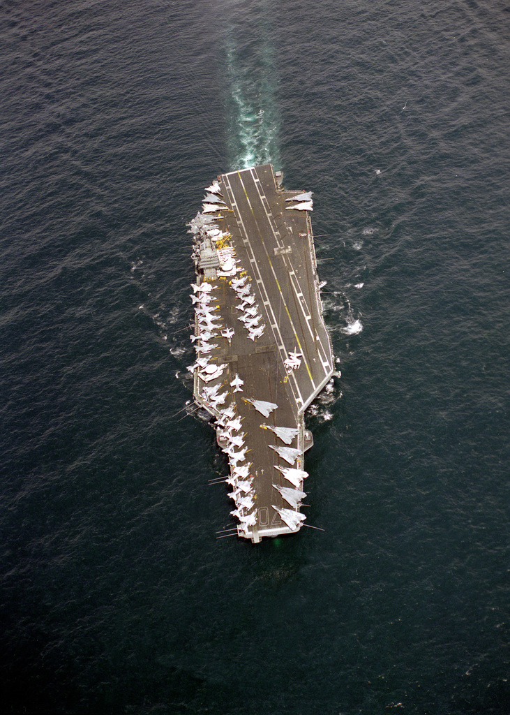 An elevated bow view of the nuclear-powered aircraft carrier USS CARL ...