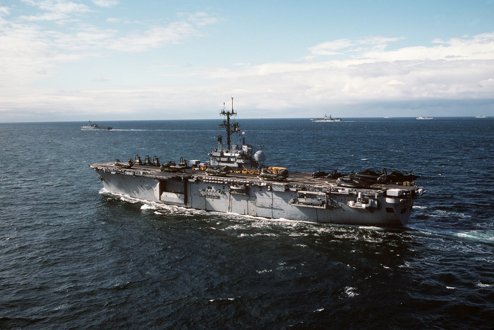 A port quarter view of the amphibious assault ship USS INCHON (LPH 12 ...