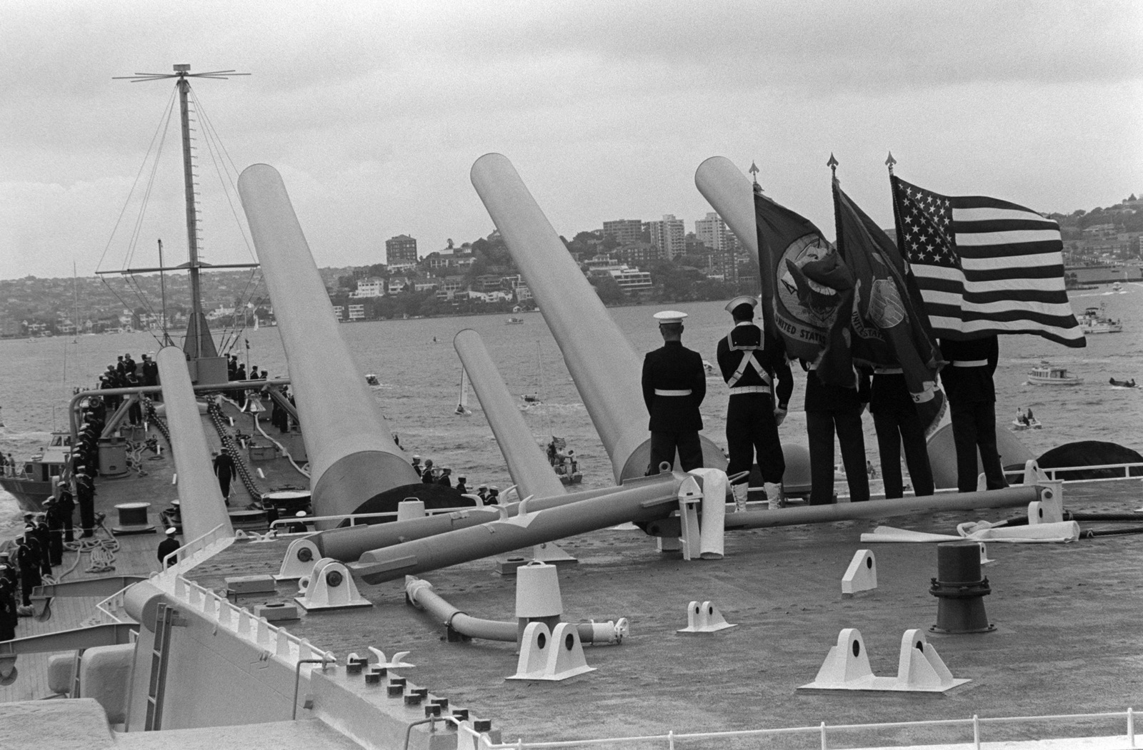 A Color Guard Stands Atop The No 2 Mark 7 16 Inch 50 Caliber Gun Turret And Crew Members Man