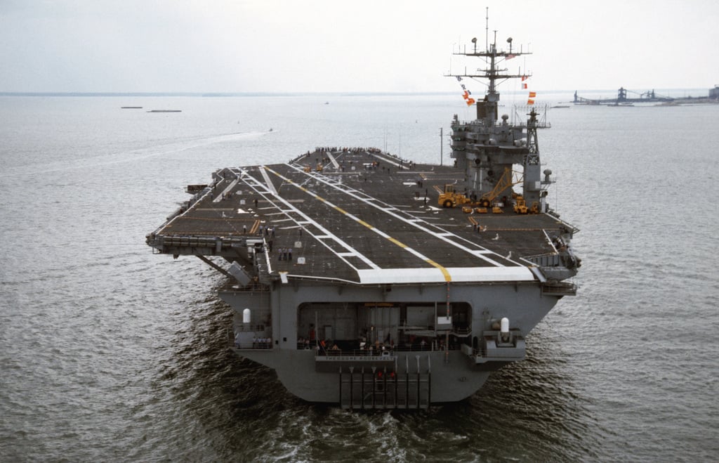 A stern view of the nuclear-powered aircraft carrier USS THEODORE ROOSEVELT (CVN 71) underway - PICRYL - Public Domain Media Search Engine Public Domain Search