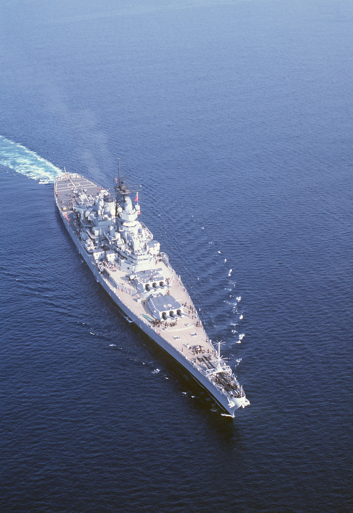 An elevated starboard bow view of the battleship USS MISSOURI (BB 63 ...