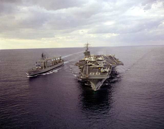 The fleet oiler USS CALOOSAHATCHEE (AO-98) replenishes the nuclear ...