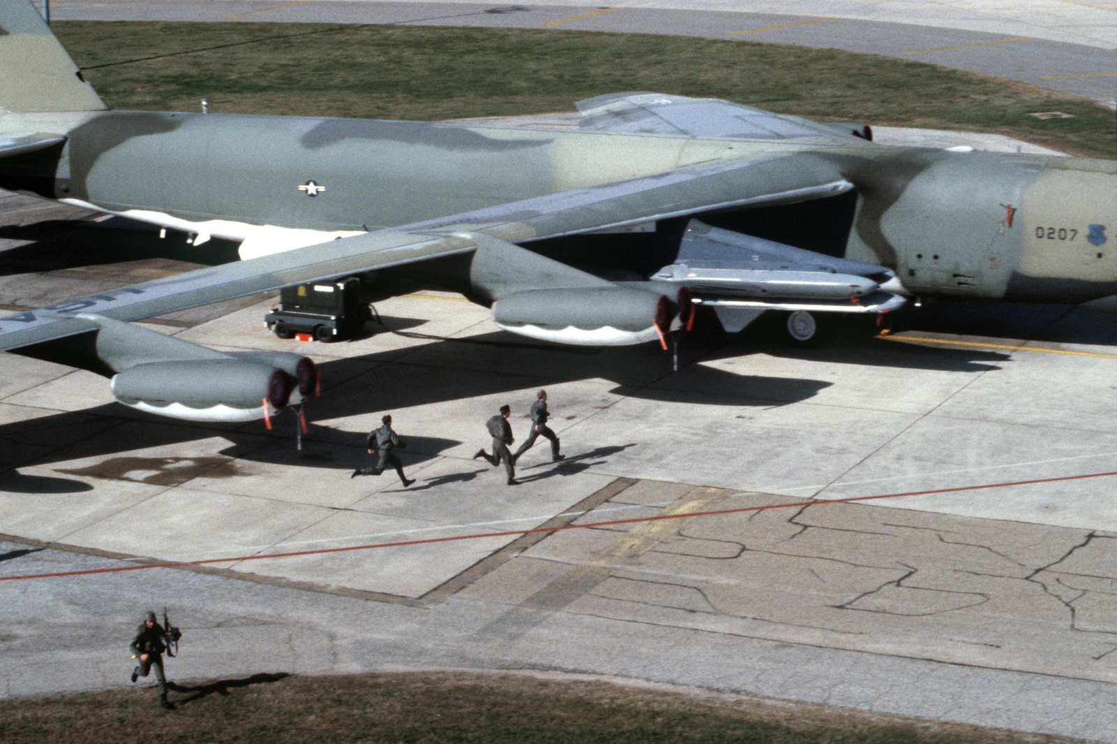 An Elevated View Of An Air Crew Dashing To Their B-52G Stratofortress ...