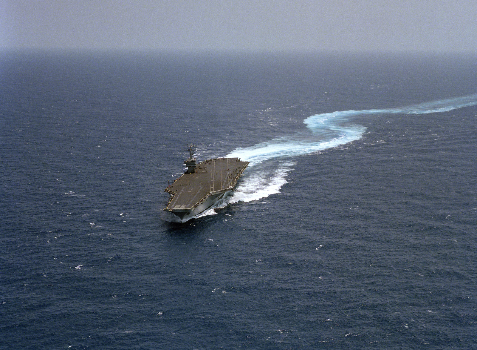 An elevated bow view of the nuclear-powered aircraft carrier USS DWIGHT ...