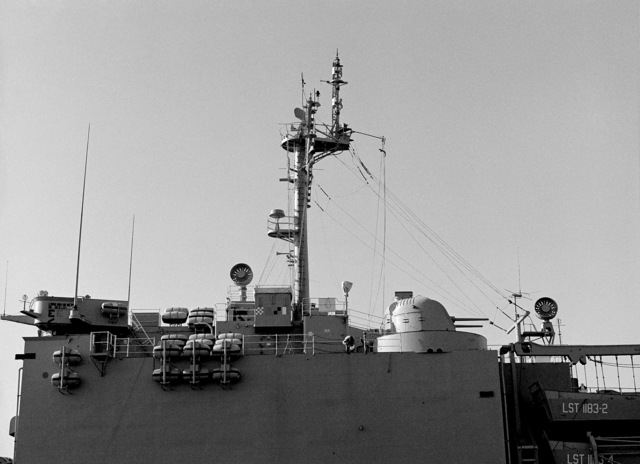 A port amidships view of the mast and superstructure of the tank ...