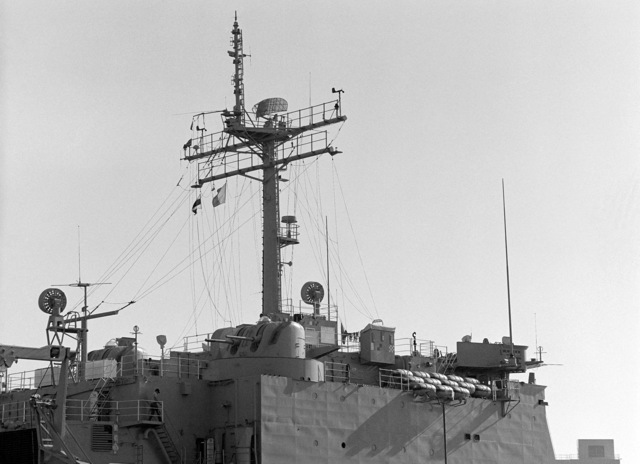 A starboard amidships view of the mast and superstructure of the tank ...