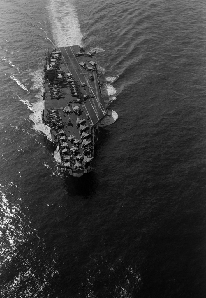 An aerial bow view of the nuclear-powered aircraft carrier USS NIMITZ ...