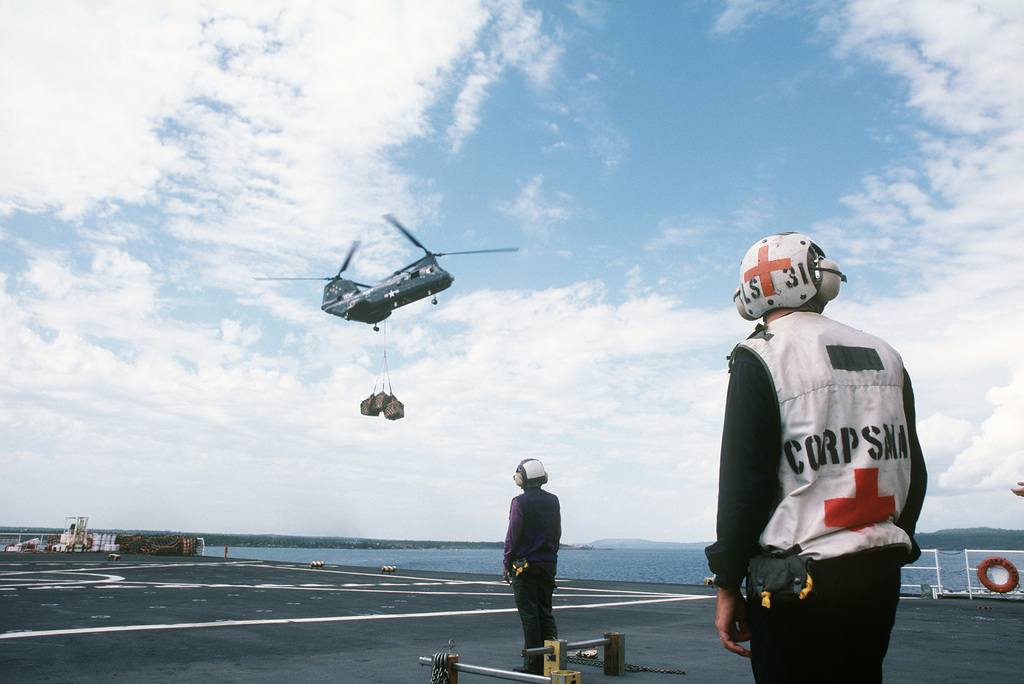 A Corpsman Stands By As A Helicopter Combat Support Squadron 5 (HC-5 ...