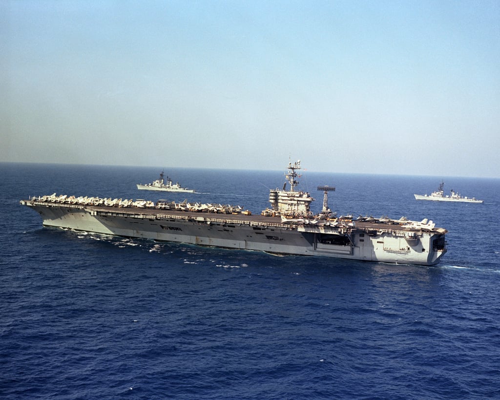 An aerial port quarter view of the nuclear-powered aircraft carrier USS ...