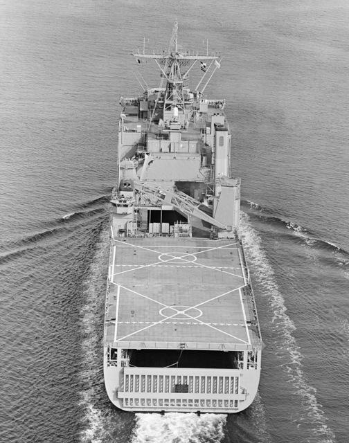 An aerial stern view of the dock landing ship USS FORT MCHENRY (LSD 43 ...