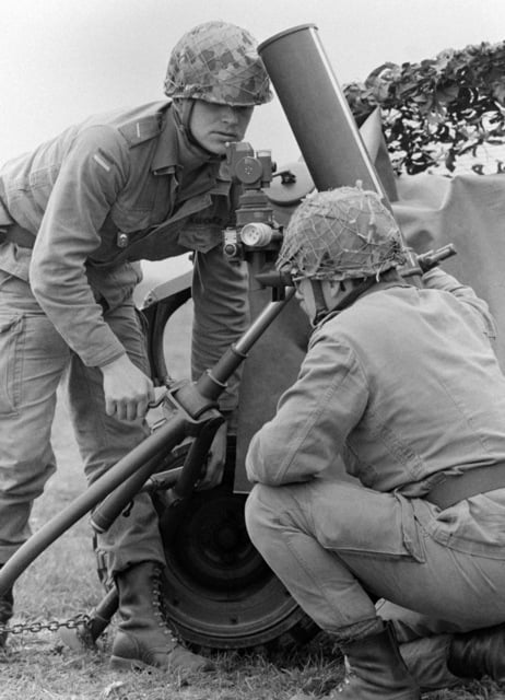 West German Soldiers prepare to fire a mortar at Lark Hill Range during ...