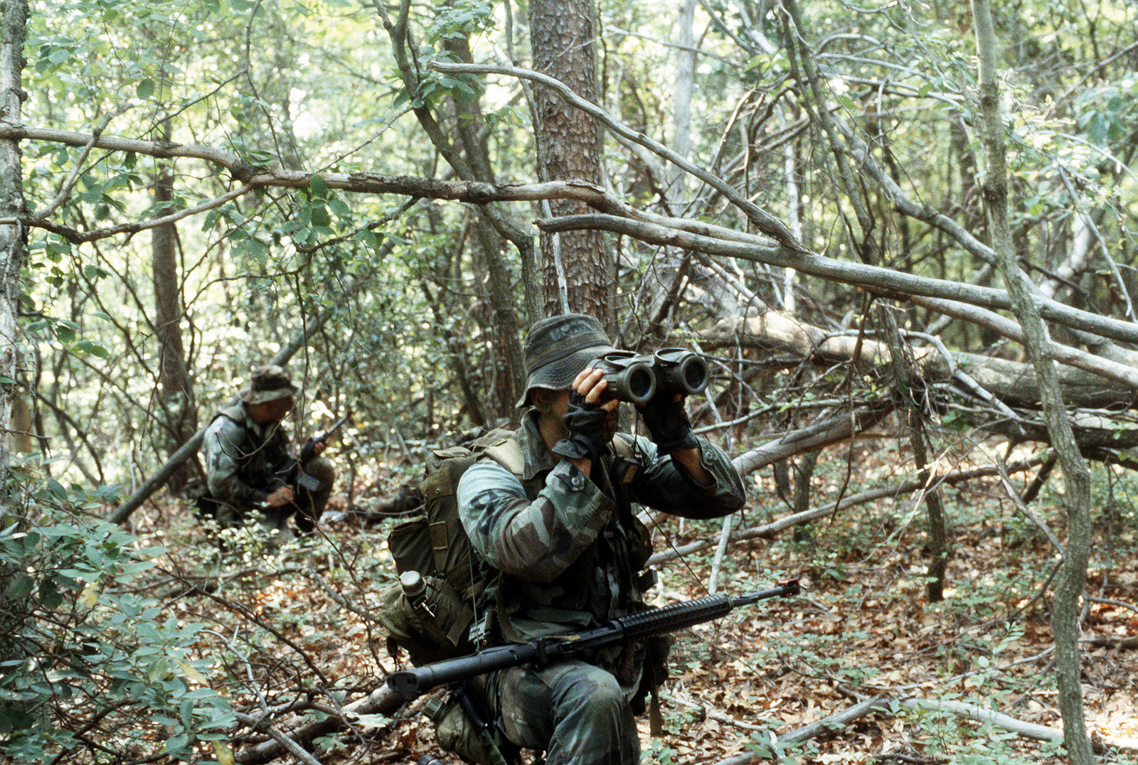 Students at the Scout Sniper Instructor School armed with M-16A2 rifles ...