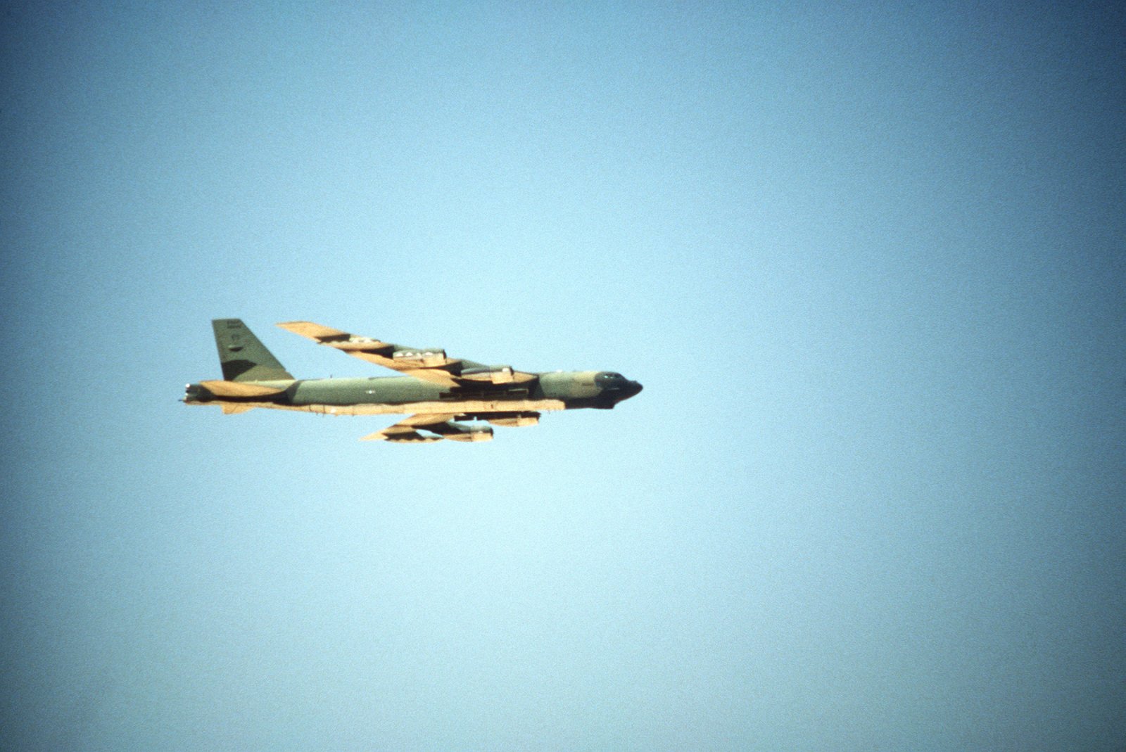 A Right Side View Of A B-52 Stratofortress Aircraft Flying Over The ...