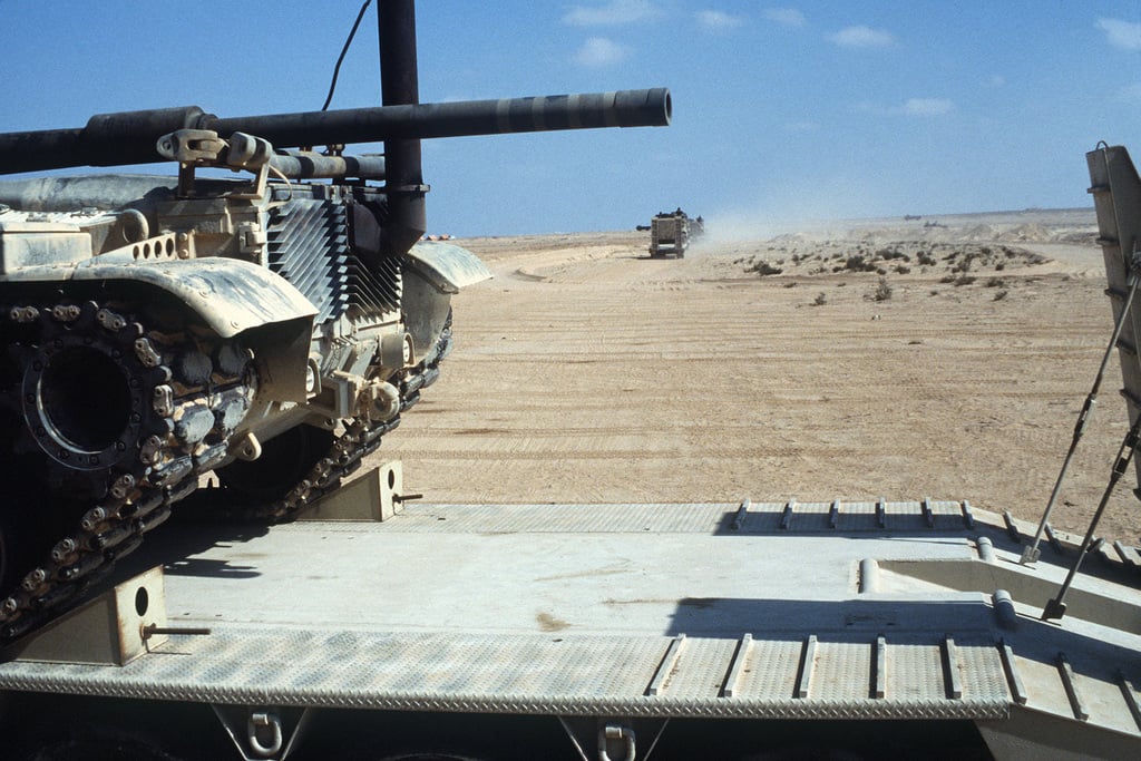 An M60 Main Battle Tank Sits On A Trailer As Equipment Is Prepared For