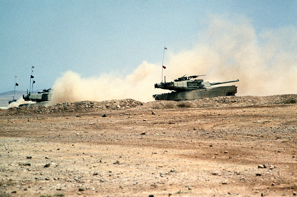 M-1A1 Abrams main battle tanks maneuver through smoke during Exercise ...