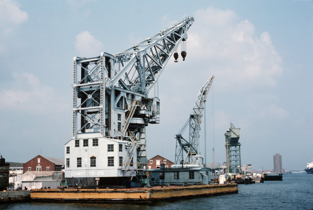 A view of the heavy lift barge crane YD-26 moored at Norfolk Navy