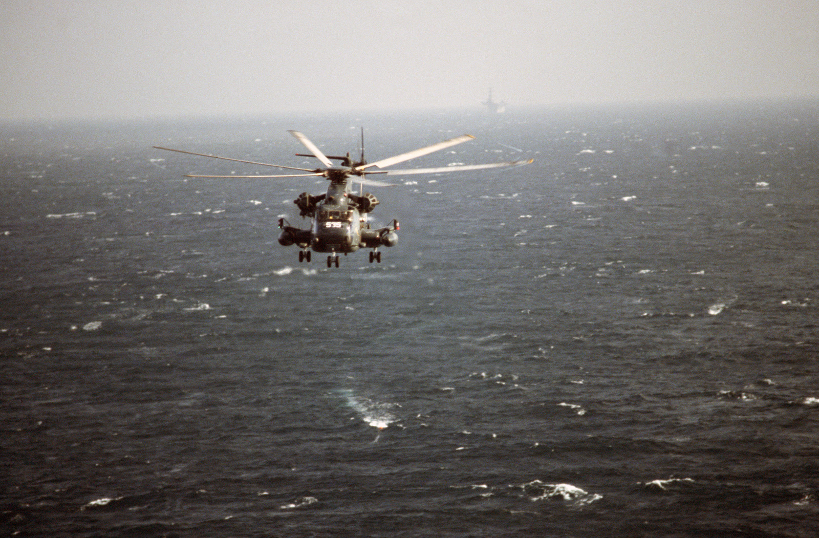 An air-to-air front view of a Helicopter Mine Countermeasures Squadron ...