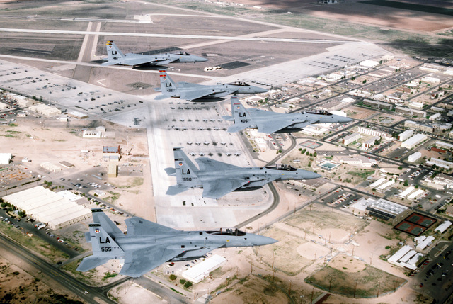 Air to air right side view of a formation of five F-15 Eagle fighters ...