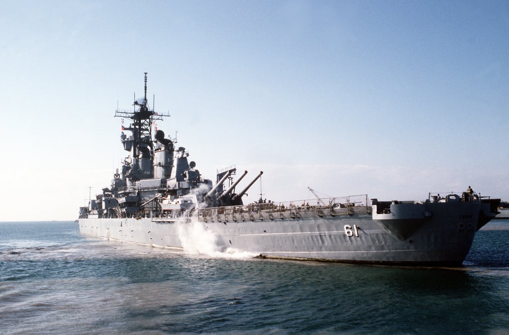 A port quarter view of the battleship USS IOWA (BB 61) as it departs ...