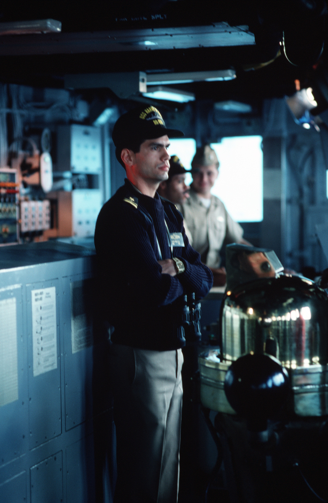 lieutenant-junior-grade-ltjg-espinoza-stands-on-the-bridge-of-the