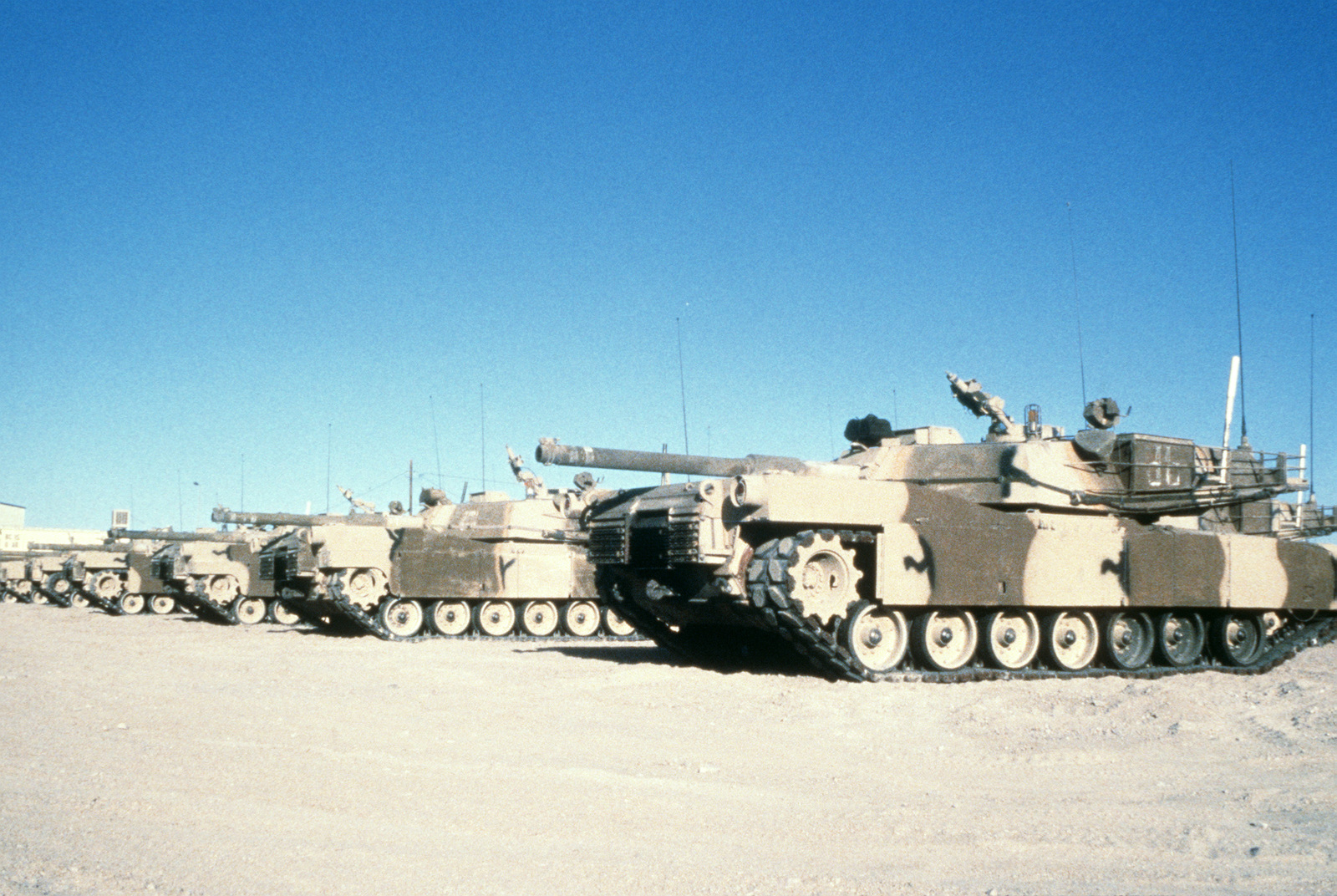 M1 Abrams main battle tanks parked at the National Training Center ...