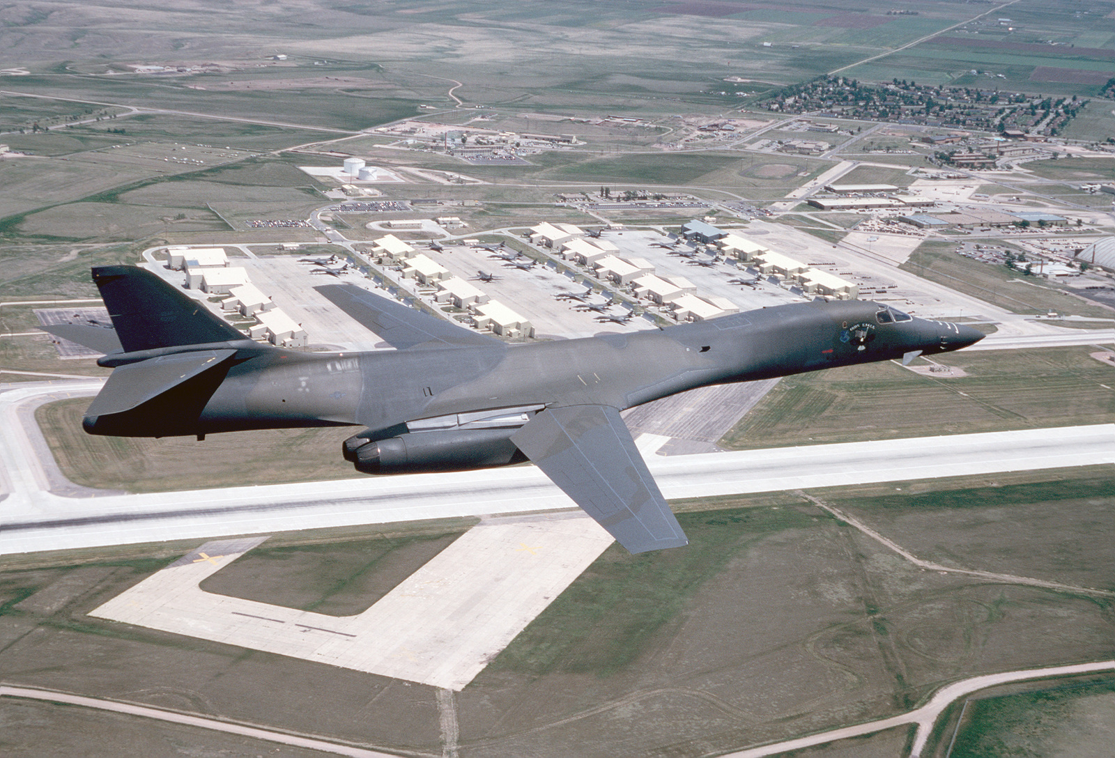 An Air-to-air Right Side View Of A 28th Bombardment Wing B-1B Aircraft ...