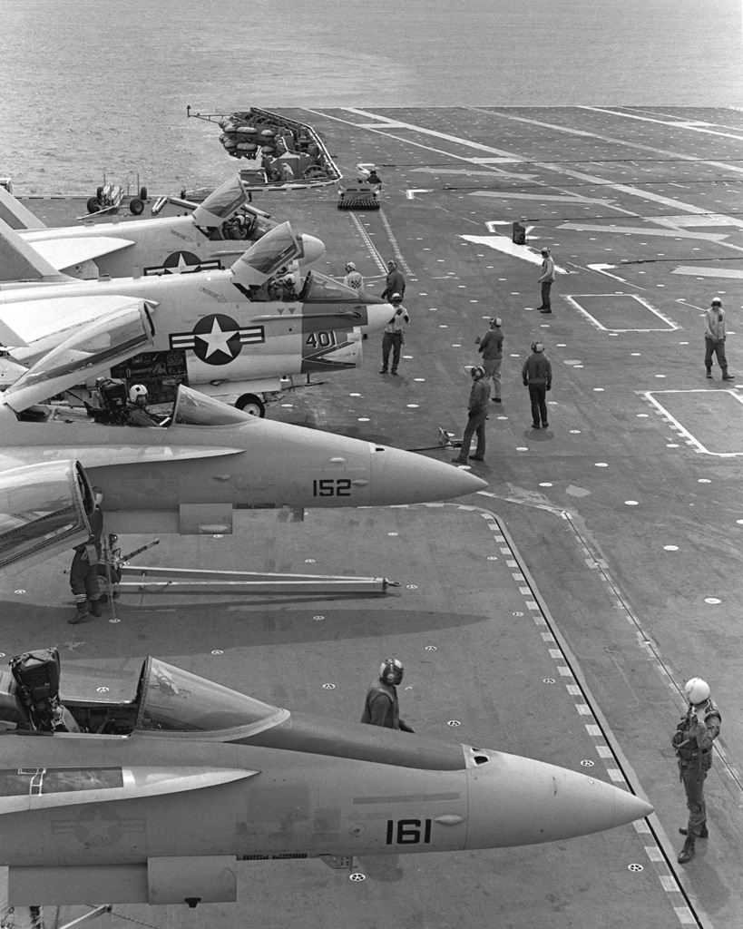 A TF/A-18A Hornet aircraft, foreground, an F/A-18A Hornet aircraft and ...