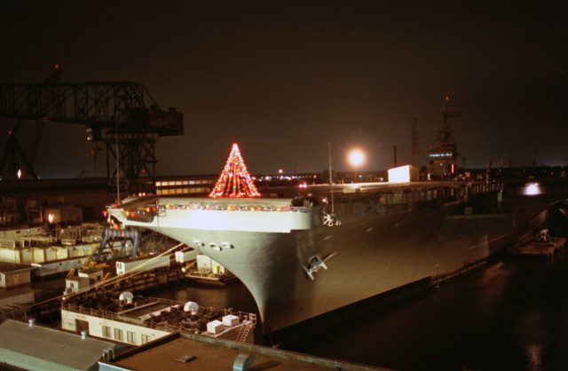 A Christmas Tree Decorates The Bow Of The Nuclear-powered Aircraft 