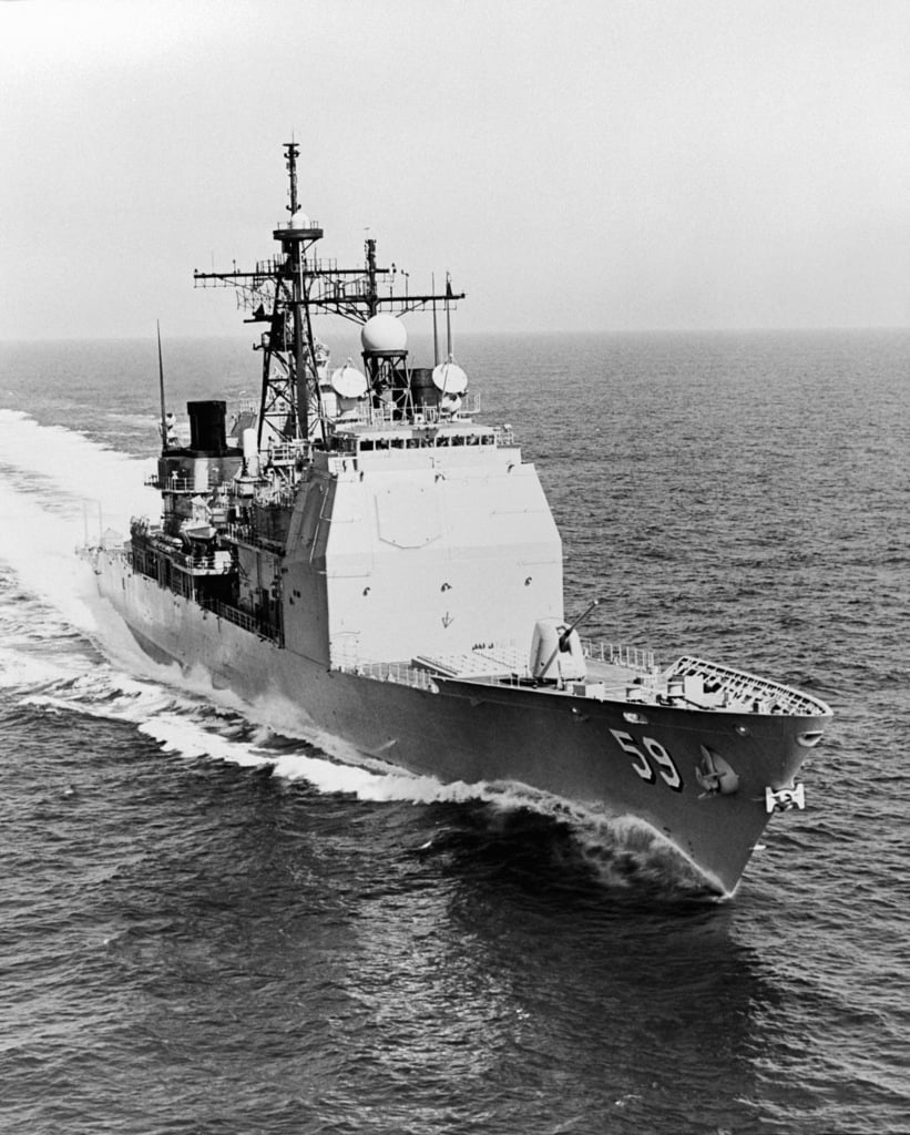 An aerial starboard bow view of the guided missile cruiser USS ...