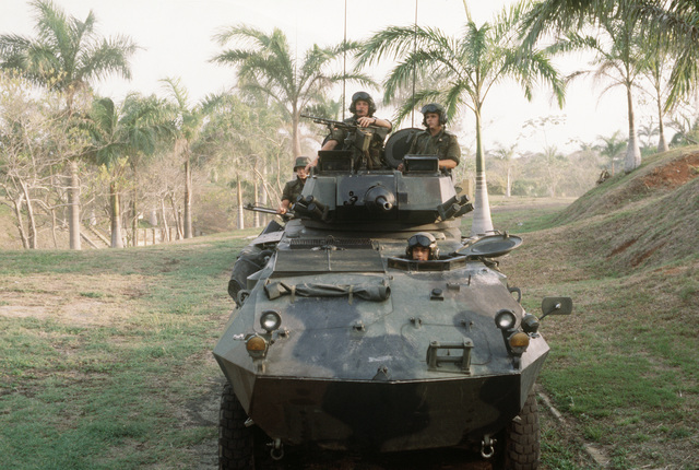 Marines In An LAV25 Light Armored Vehicle (LAVs) Approach The Bivouac ...