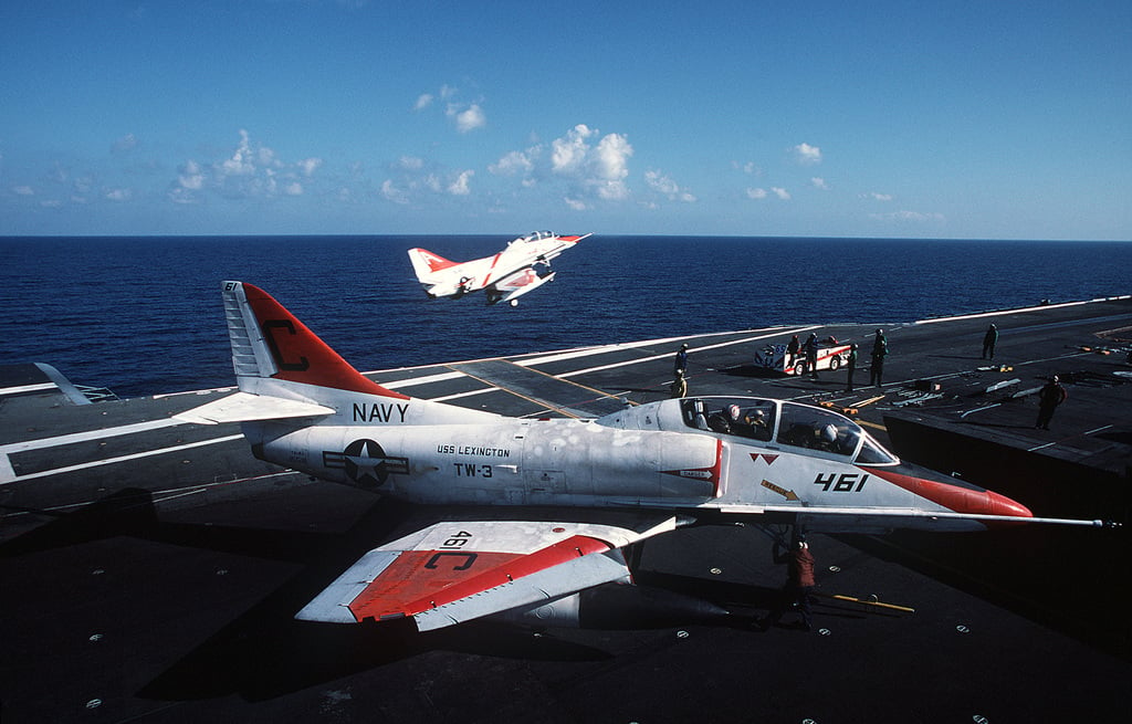 A Ta J Skyhawk Aircraft Waits Behind The Blast Deflector For Its Turn At The Catapult As