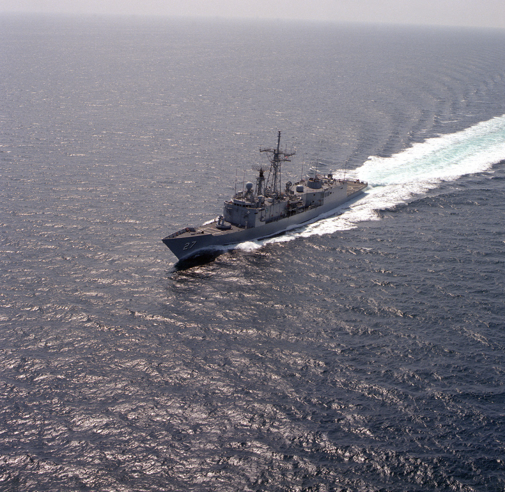 A port beam view of the guided missile frigate USS MAHLON S. TISDALE ...