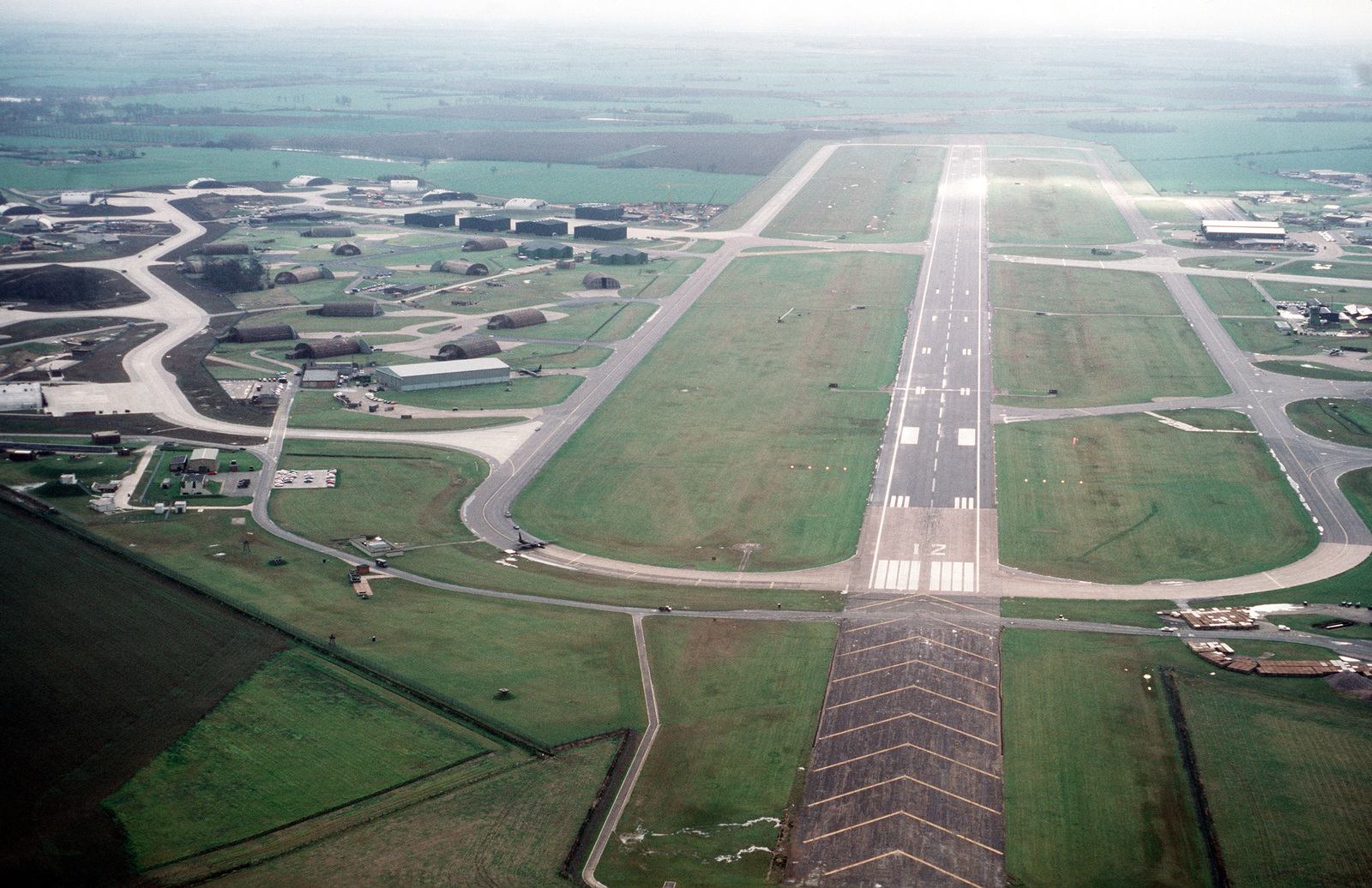 an-aerial-view-of-a-portion-of-the-base-showing-the-main-runway-and