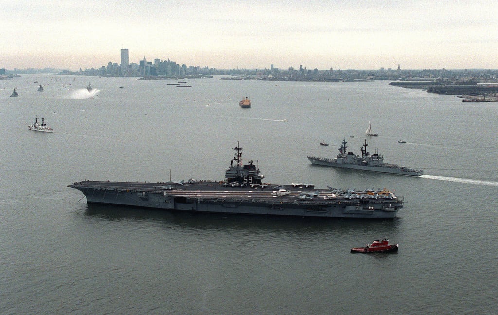 The destroyer USS HAYLER (DD-997) and other U.S. Navy ships pass the ...