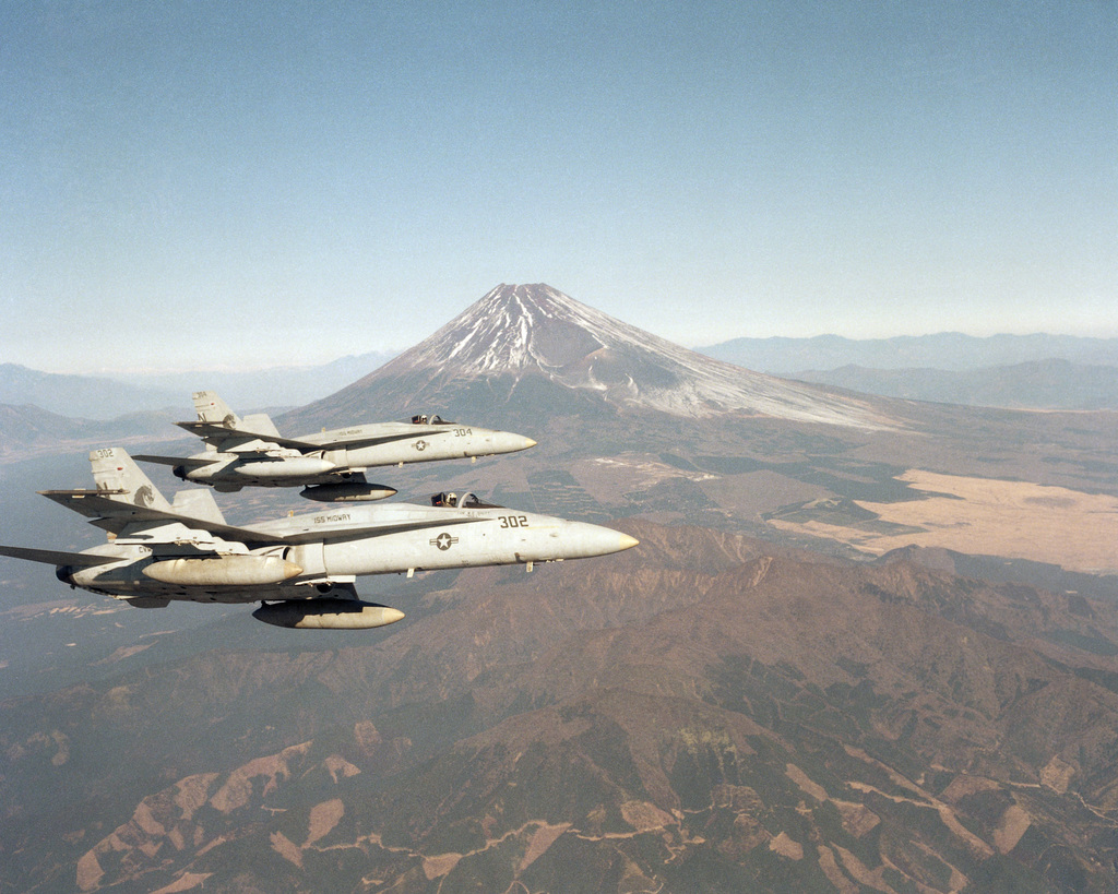 A pair of F/A-18A Hornet aircraft from Strike Fighter Squadron 192 (VFA ...