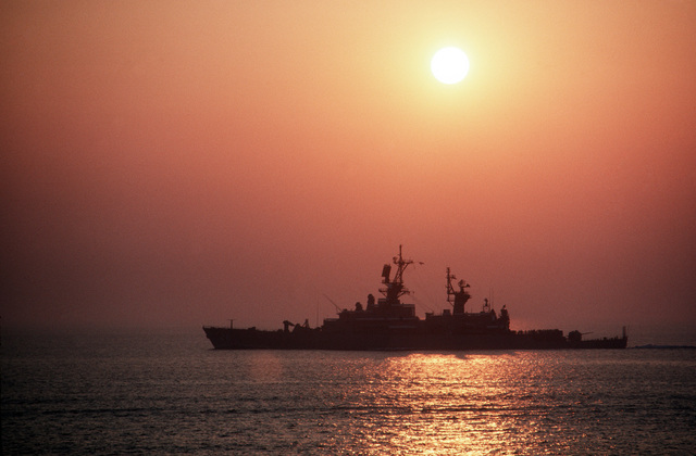 A Port Beam Silhouette Of The Guided Missile Cruiser USS BELKNAP (CG 26 ...