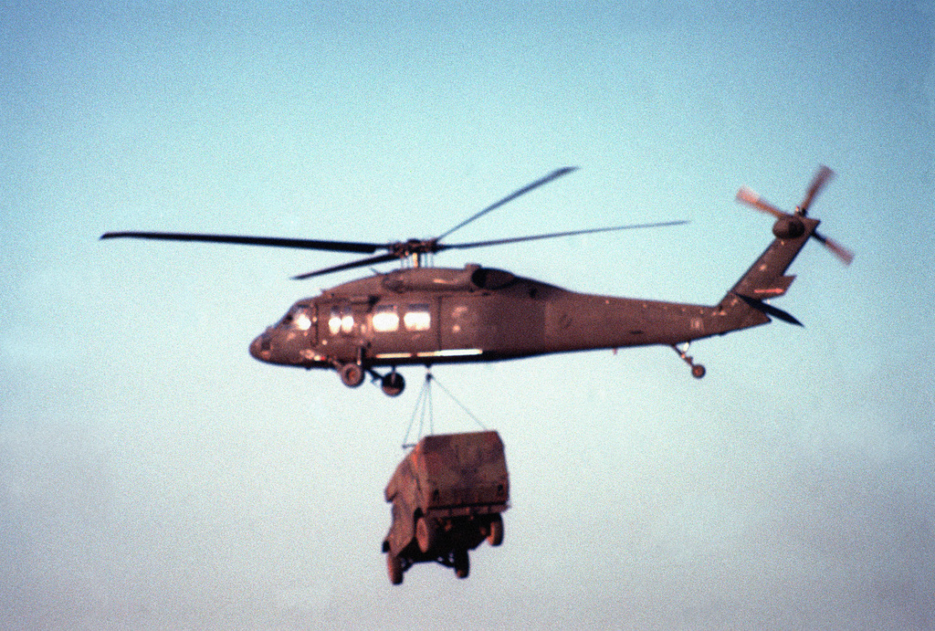 An M998 High-Mobility Multipurpose Wheeled Vehicle (HMMWV) configured ...